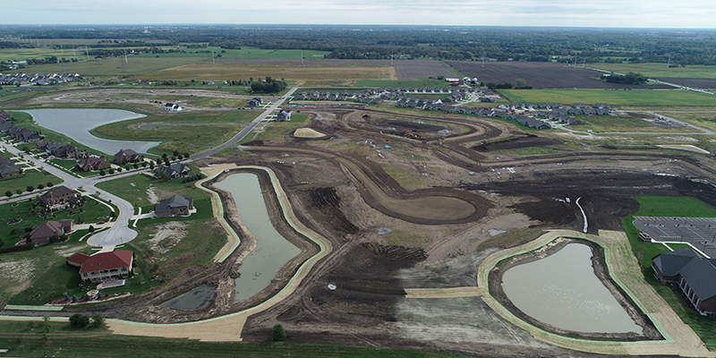 Wide Aerial Shot of Gates of St. John Project Site
